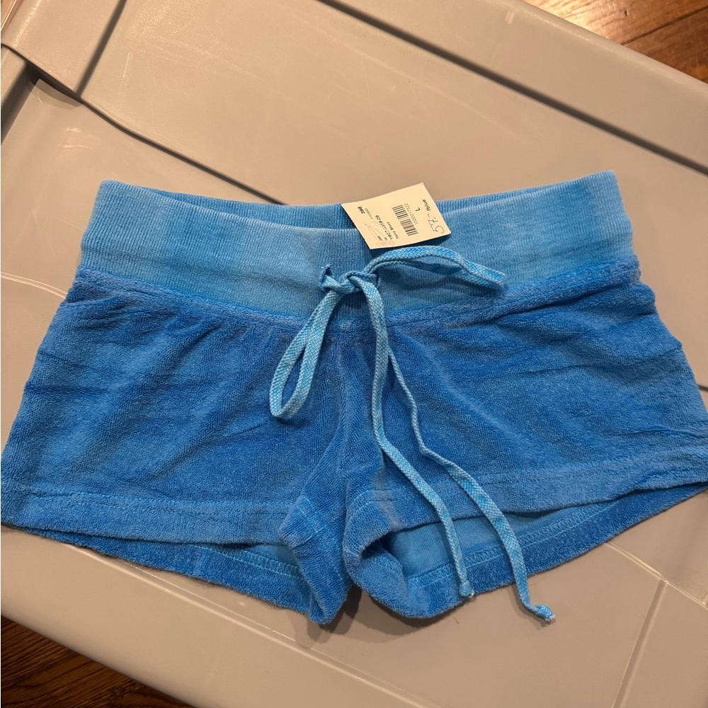 Hard Tail Terry Cloth shorts 
Size Kids Large
Neon Blue
Never worn with tags